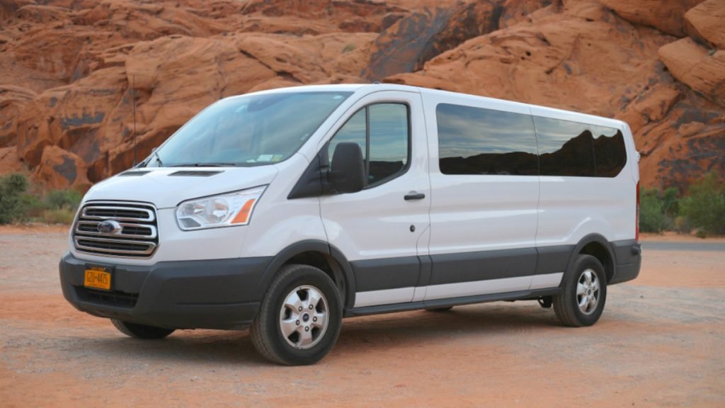 Spacious 15 seater van rental in Dubai ideal for tours, airport transfers, staff transport, and group travel with driver and luggage space.