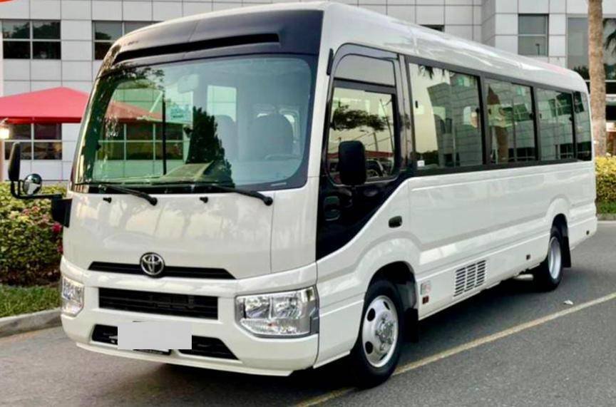 Group transportation bus rental service in Dubai for events, tours, and staff travel-a-one bus rental