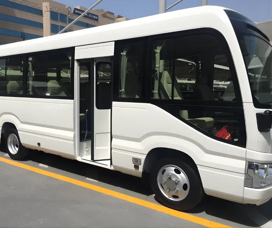 28 Seater Mini Bus in Dubai for large group travel, airport transfers, tours, and staff transport with spacious seating and reliable service
