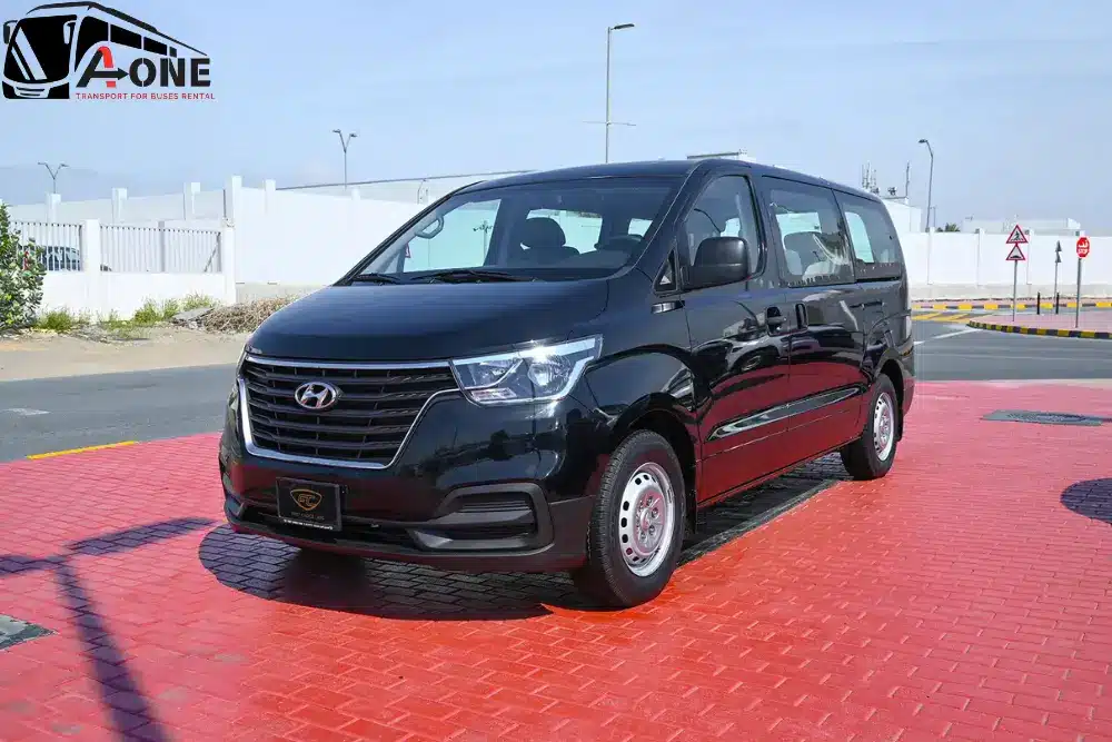 Hyundai H1 12-seater van for rent in Dubai, perfect for family trips, group travel, and corporate transfers - A-one bus rental