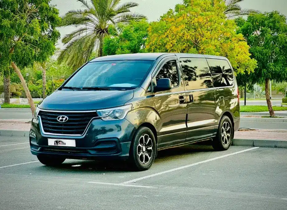 Hyundai H1 Hyundai Starex 7 seater rental in Dubai with professional driver for family travel, airport transfers, and corporate trips
