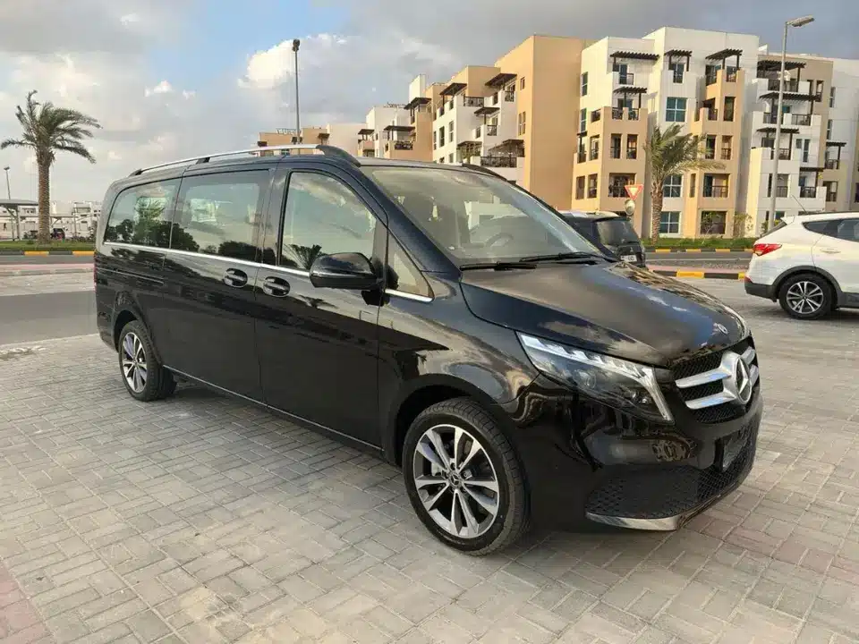 Mercedes Benz V Class luxury van rental in Dubai with professional chauffeur for VIP airport transfers, corporate travel and executive city tours