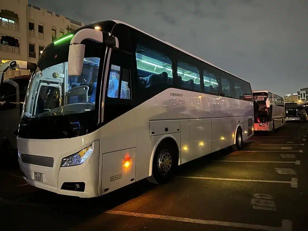 Modern passenger bus available for hire in Dubai for tours, events, and group travel