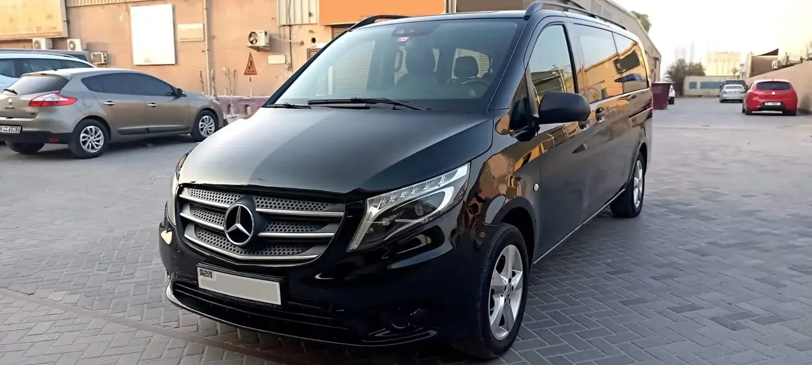 Passenger van available for hire in Dubai for airport transfers, tours, and group travel - A-One bus rental